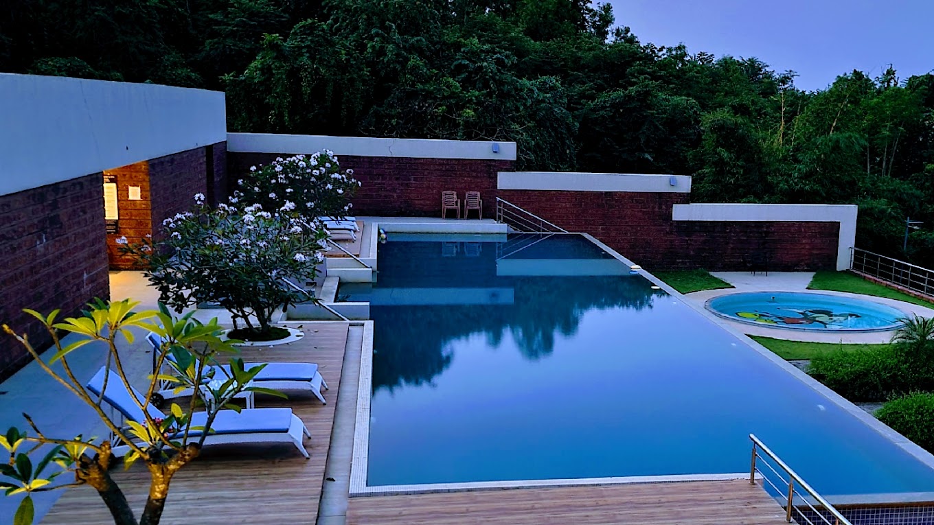 best private beach resorts in india: coastal escape resort & spa infinity pool  view