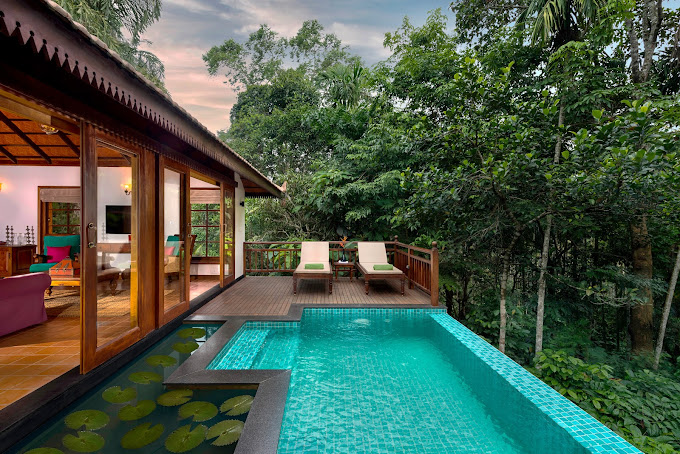 heritage plantation stay: rainforest resorts in kerala pool view