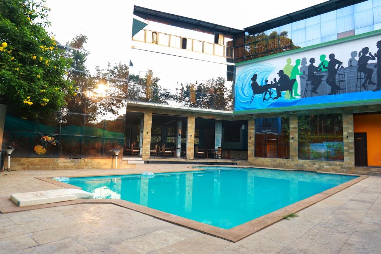 Weekend Stays Within 2-3 Hours From Mumbai: Alibaug Forest Escape pool with property view