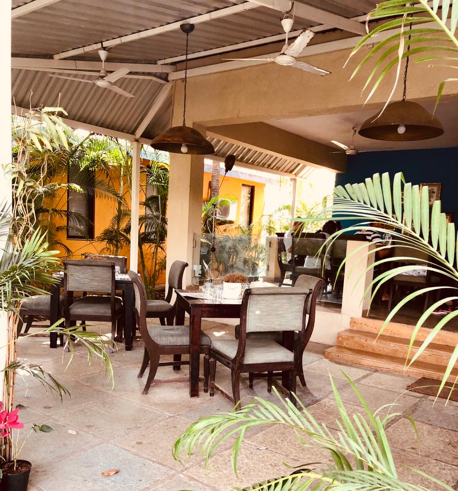 villa in alibaug near the beach: tropical retreat beach resort dining area view