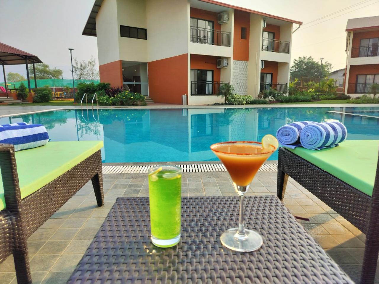 Pet-Friendly Resorts Near Mumbai With Pet Fencing: Blissful Lifestyle Retreat, Karjat pool view