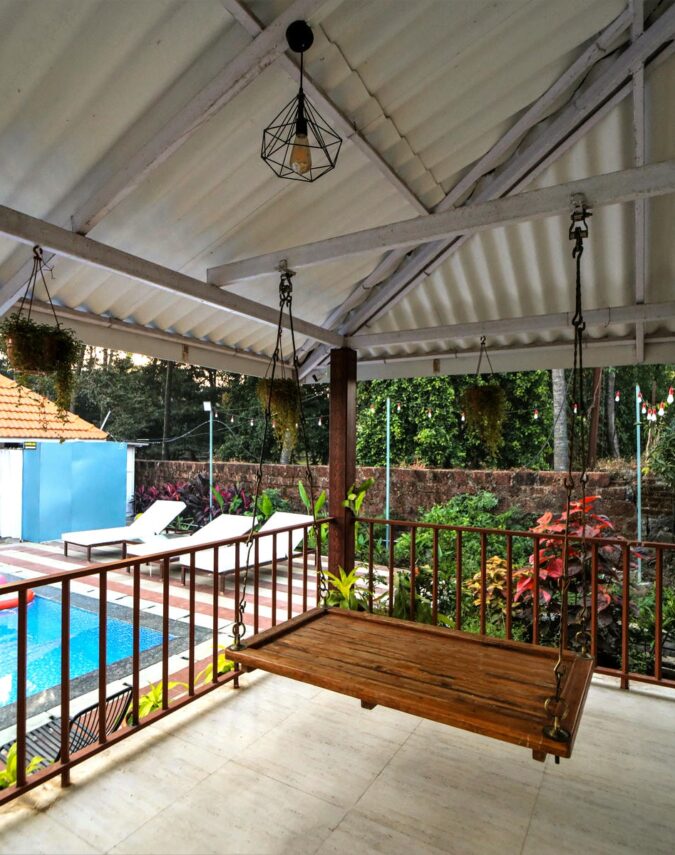 Privy Stays Coast House Villa, Alibaug, Terrace with a swing facing the swimming pool. 