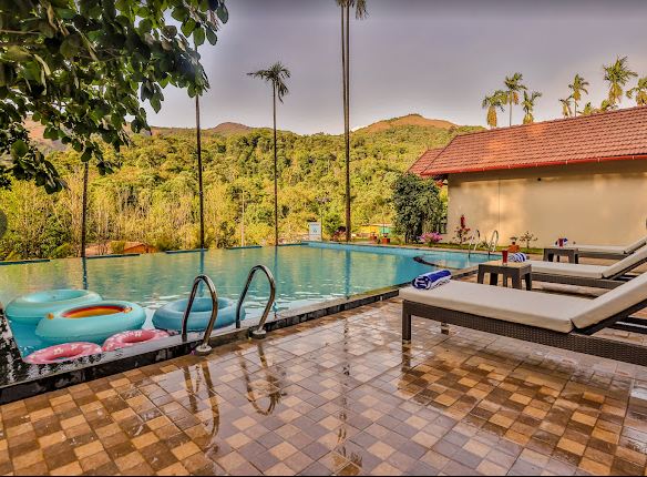 coorg crest hill retreat pool area view