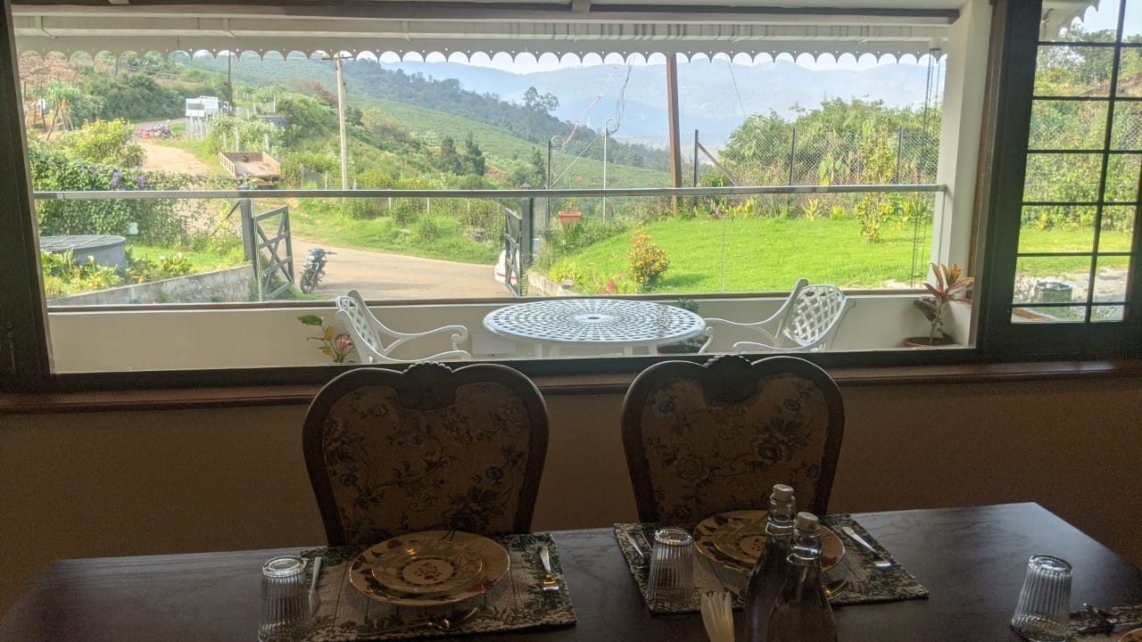 Village Resorts In Ooty: A Graceful Retreat dining with scenic view