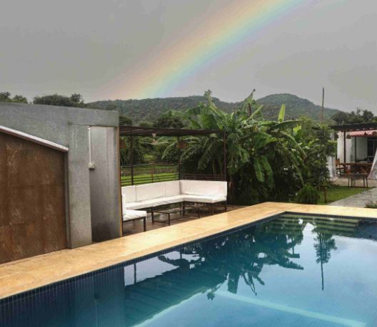 Privy Stays Happyland Private Villa, Alibaug, with Outdoor Swimming Pool facing a  beautiful view of nature. 