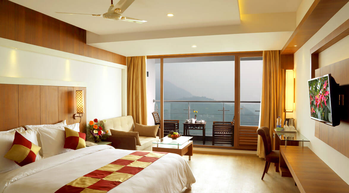 Unique resorts in Munnar: Misty Highland Hill Retreat & Spa bedroom view