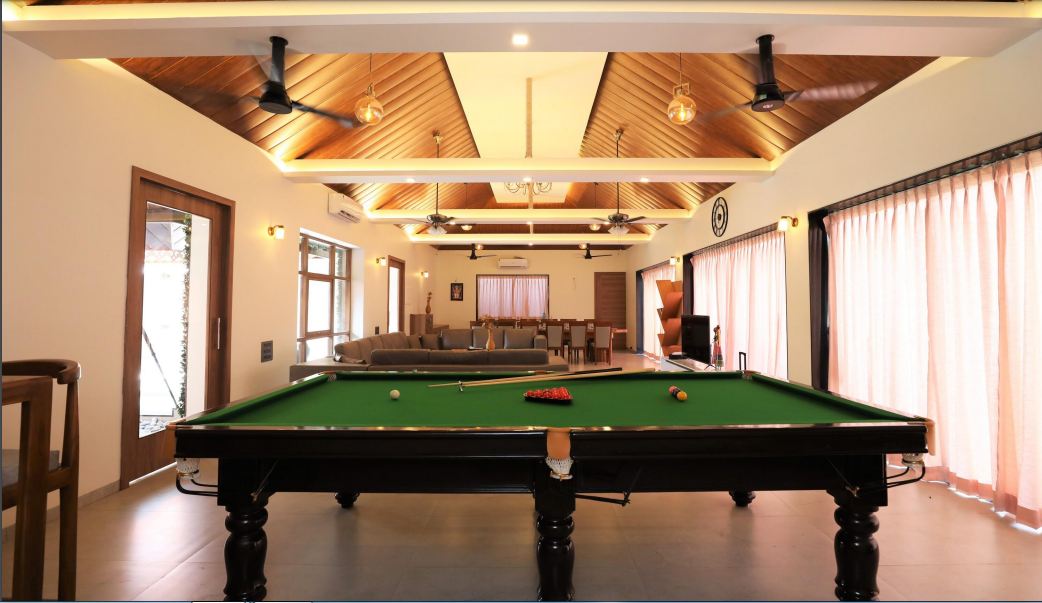 Privy Stays JK Villa Alibaug, Spacious room with a pool table