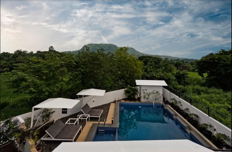 Privy Stays Kurul, Alibaug, Top View Of The Stay, Private Outdoor Pool With Sun Loungers and a view of the magnificent mountains