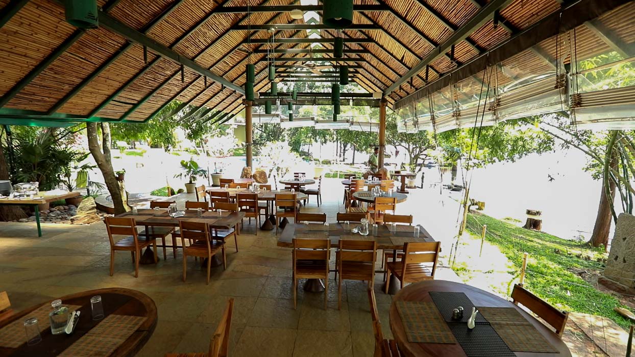 Weekend getaways from Bangalore within 200 km-Riverfront Family Resort dining view