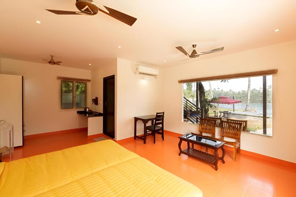 Yoga retreats in Kerala- Wellness Ayurveda Retreat one side of the room view 