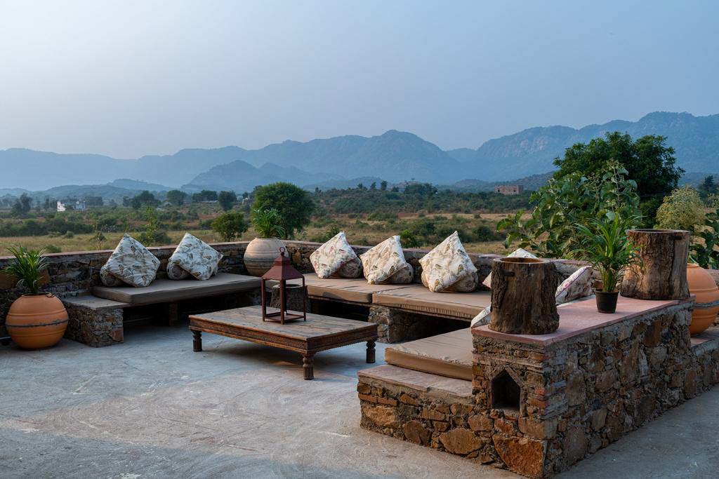 wilderness stay best jungle resorts in india lounging area view