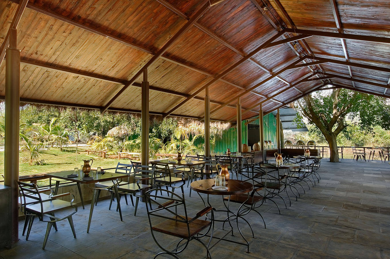 Outdoor dining area at the Dreamy Cottages On An Island in Mulshi