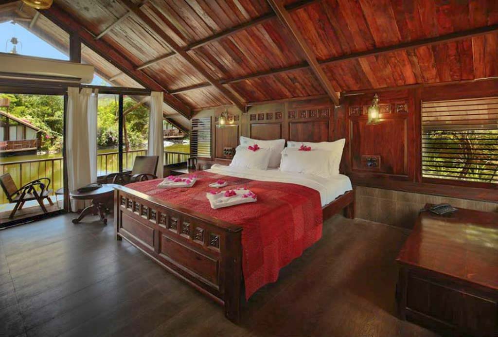 Bedroom at the Dreamy Cottages On An Island in Mulshi, one of the best riverfront resorts near Mumbai