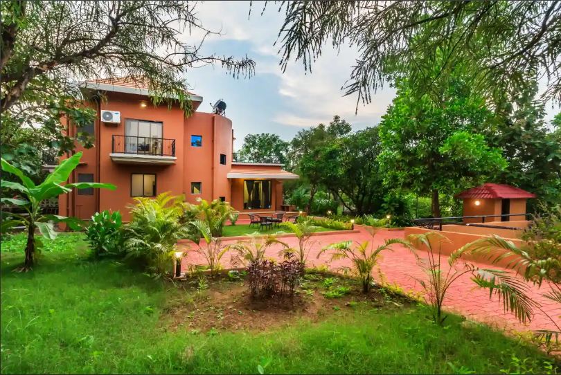 Exterior view of the Pinjal River Retreat in Palghar, one of the best riverfront resorts near Mumbai