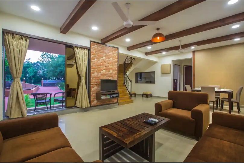 Spacious living room in the Pinjal River Retreat in Palghar