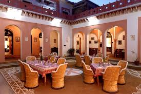 Fort Stay Near Delhi At The Lake View Palace- dining area in the courtyard view for many people