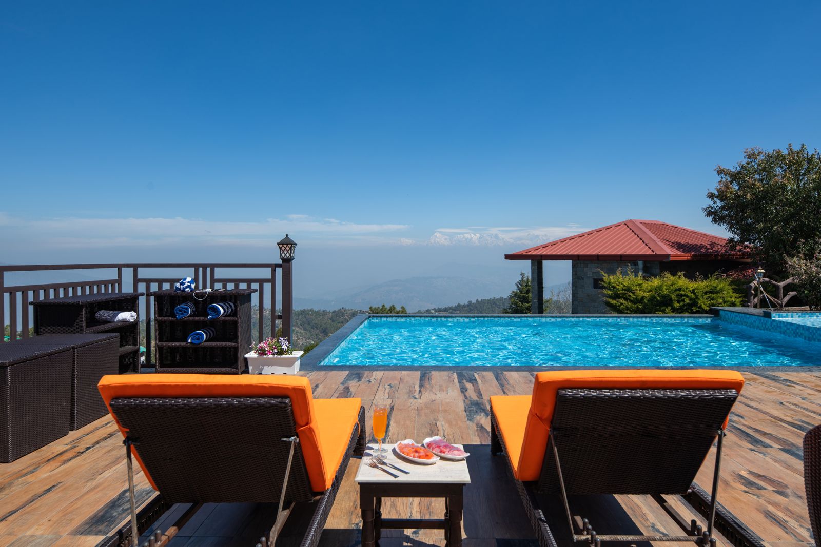 Offbeat Weekend Getaways From Delhi: Himalayan Family Resort pool view