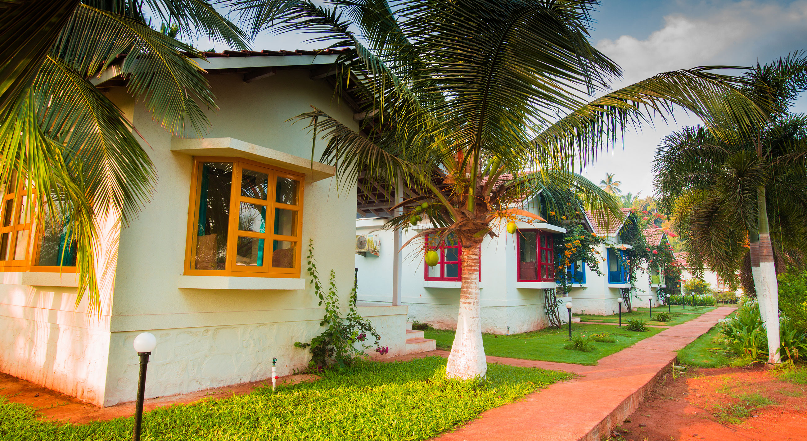 SIde view of the villas available at the Cottage Homestay at Alibaug, the perfect resort resort with bathtub amenities