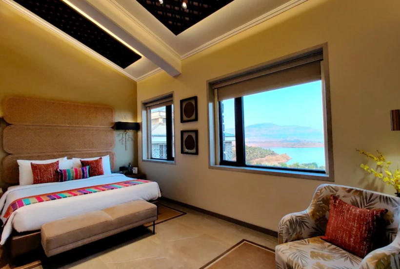 Lonavala Resorts Near Bhushi Dam- Nature's Holistic Wellness Retreat bedroom view