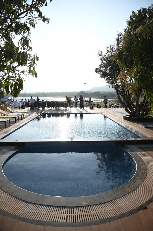 Waterfront Mango Grove Getaway pool view