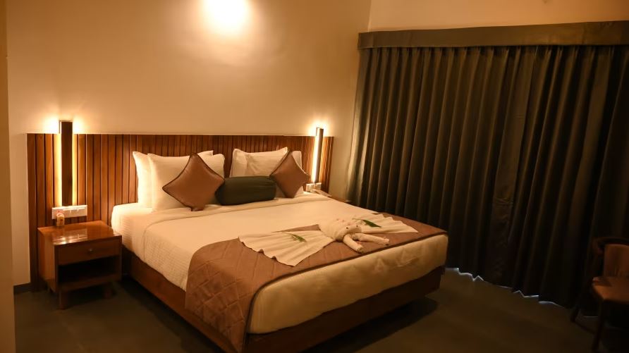 New Year Getaways From Mumbai within 200 kms: Waterfront Mango Grove Getaway bedroom view