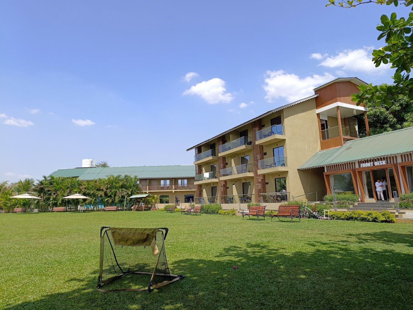 resorts for corporate outing near Mumbai with a big lawn and pool