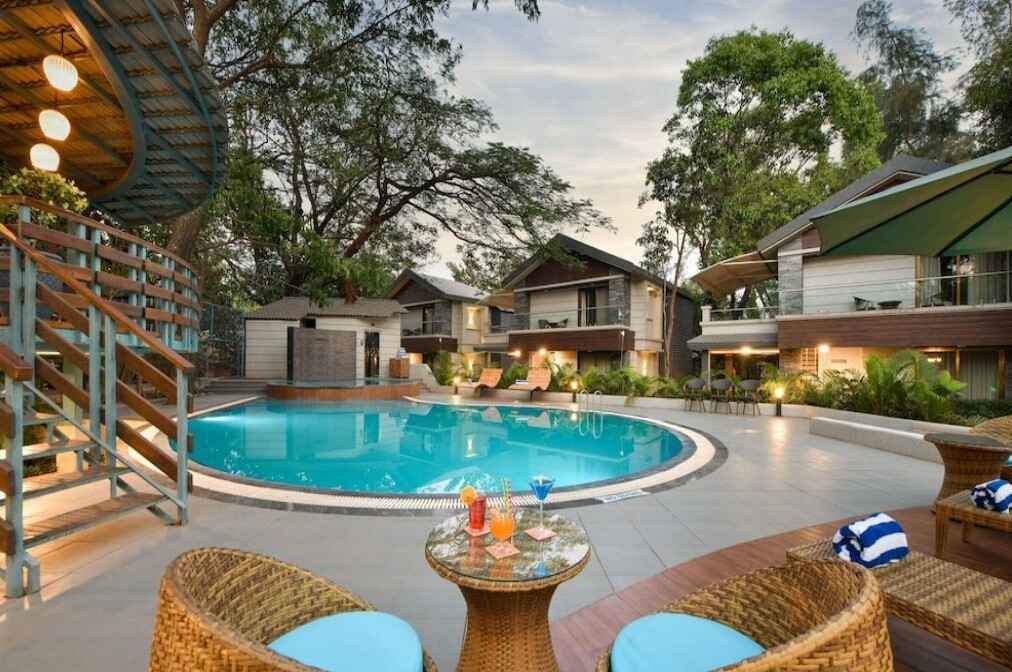 poolside lounges at the Woodland Zinc Trek, one of the best resorts in Lonavala for a destination wedding