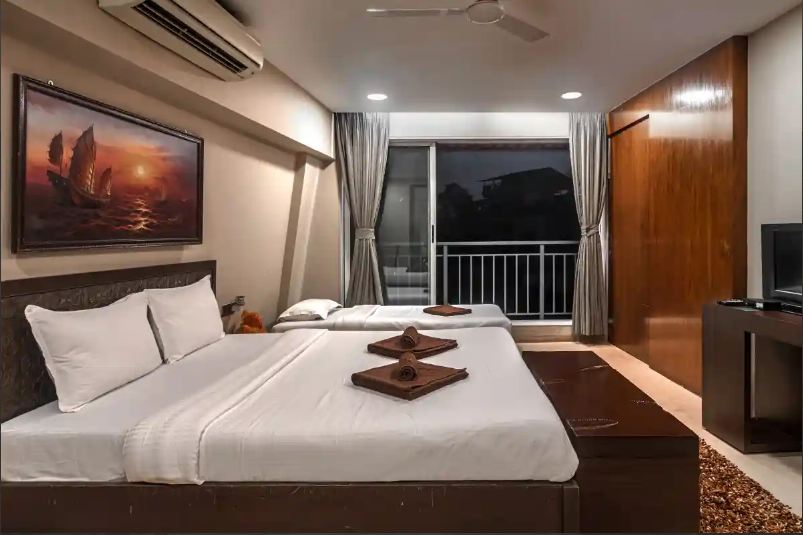 Bedroom at the Luxury Sunshine Retreat, one of the best 3BHK villas in Lonavala with pool